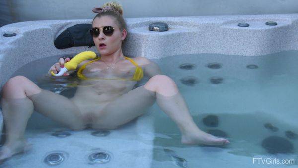 Sweet blonde inserts big dildo in her shaved pussy while in the pool - hellporno.com on pornogates.com